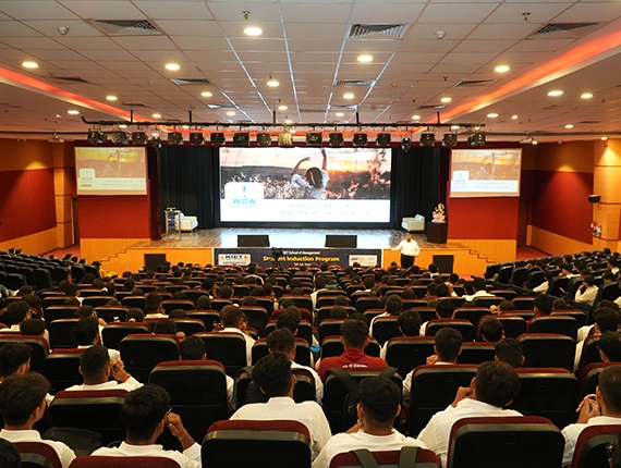 Students attending an event in the KIET auditorium