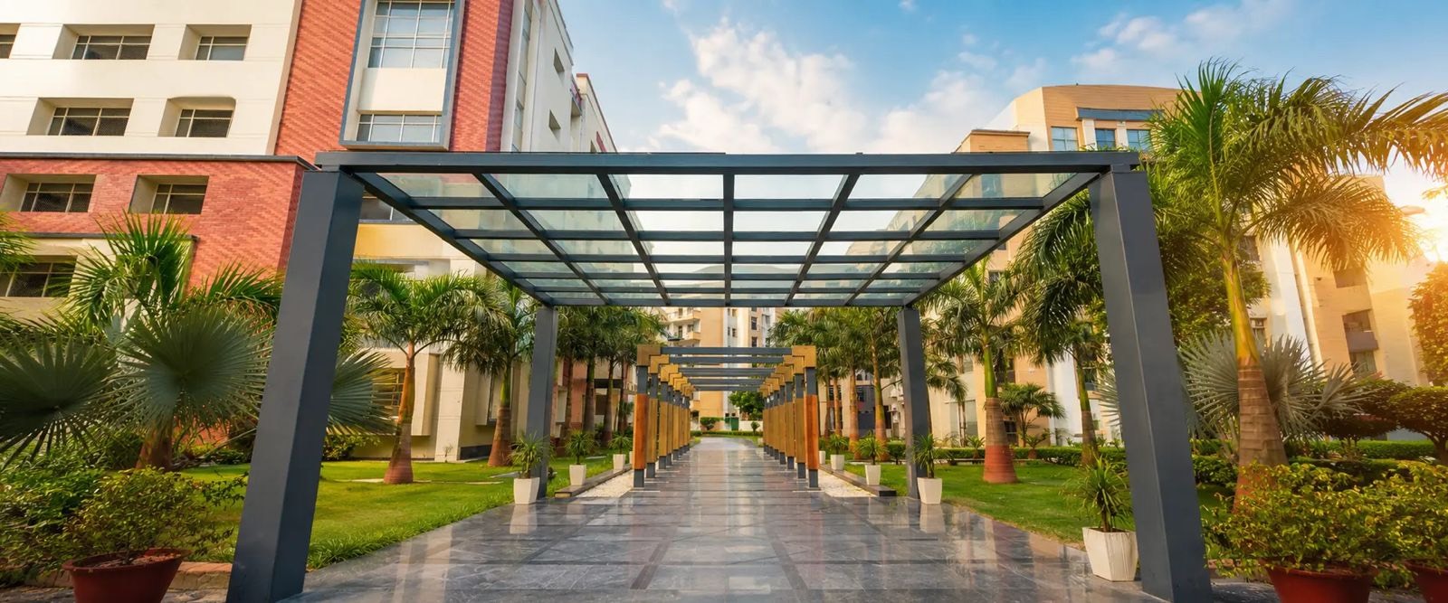 Covered walkway through the KIET campus gardens